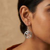Woman wearing silver Om drop earring – 925 sterling, 20mm | Ramsons Handicrafts